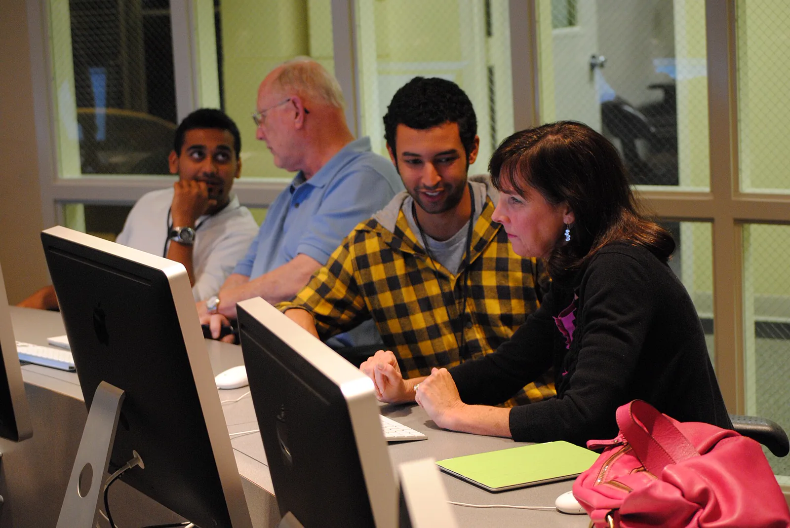 Students learning on computers at a community technology centre